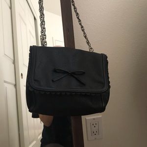 Urban outfitters brand black bow purse